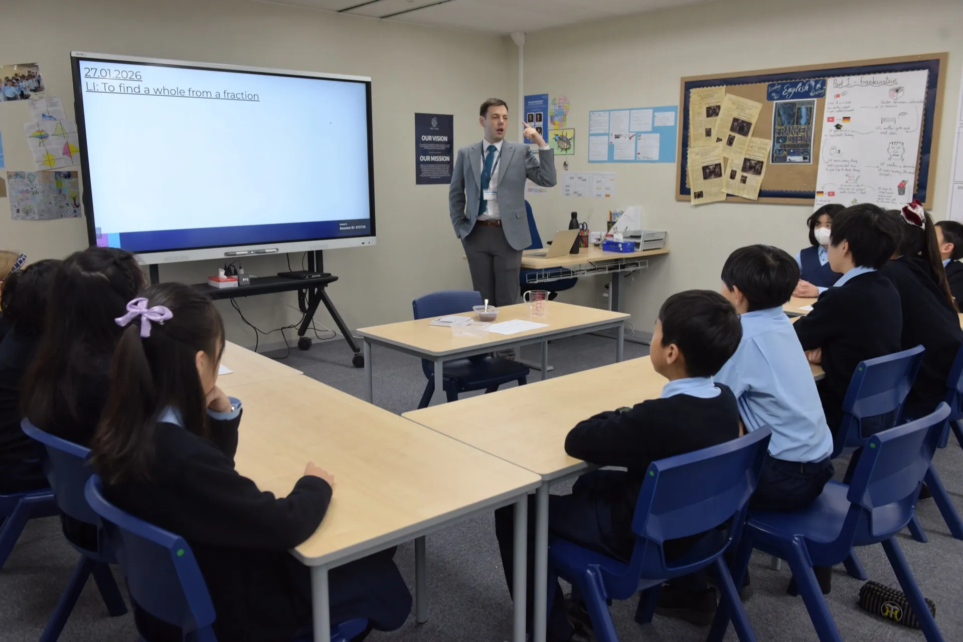 Teacher presenting at NLCS Kobe